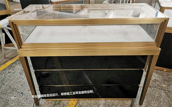 高端飾品展示柜_不銹鋼玻璃飾品柜臺(tái)展示柜